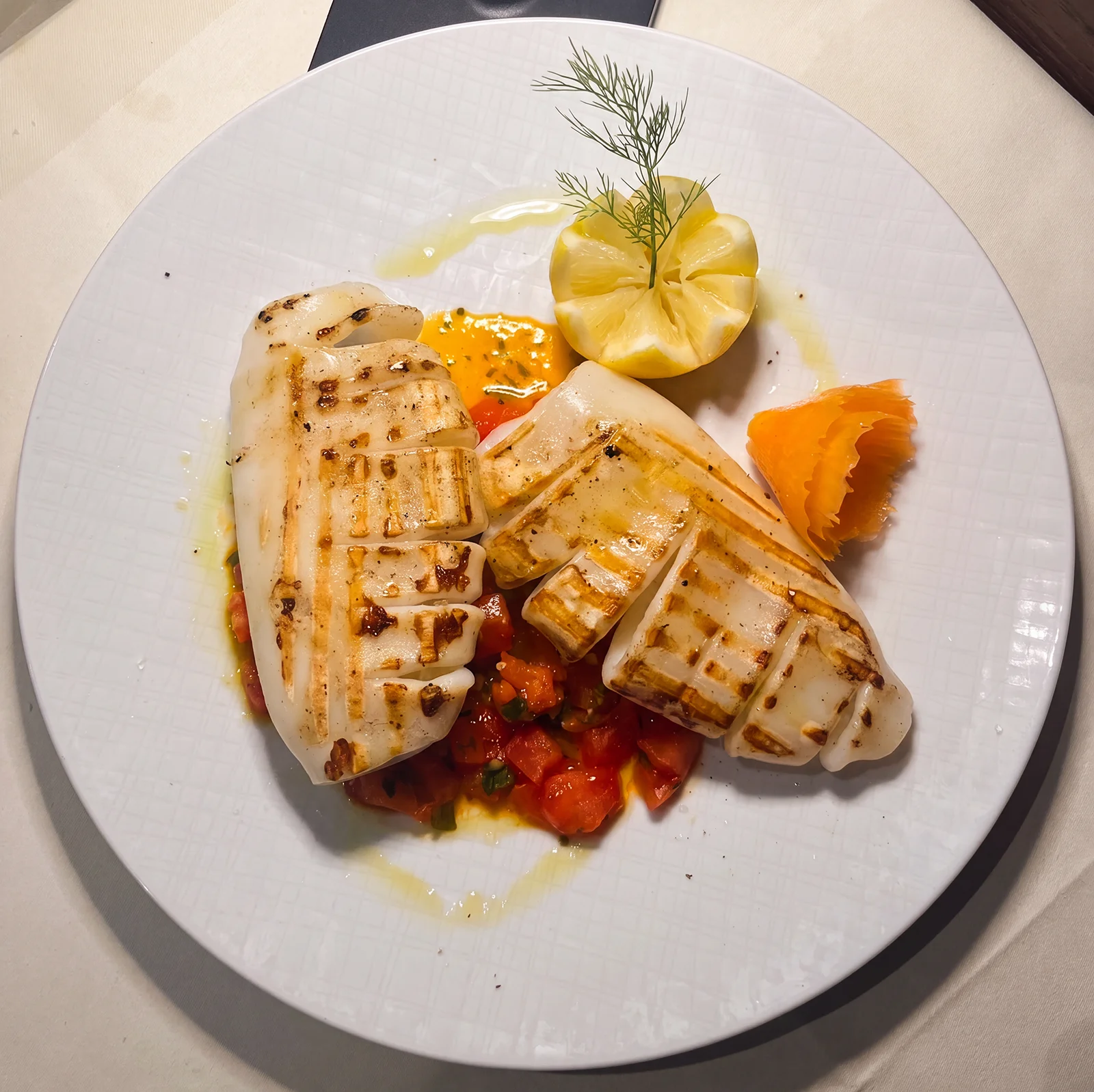 Gegrillter Calamaro auf Tomatenconcassé im Ristorante Waldhorn in Nagold